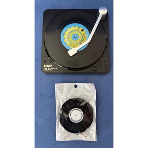 Melody Ensani Productions Earrings & Preowned Cap Gun Vinyl Coasters